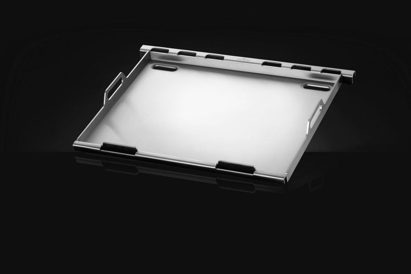 Metallic tray on a black background