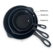 Set of three black cast iron skillets with measurements on a white background