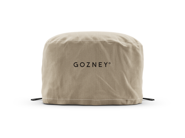 Beige pot cover with 'Gozney' branding on a white background