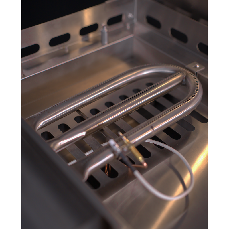 Metallic grill grate with a heating element inside a barbecue