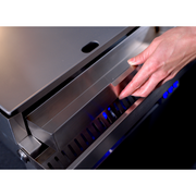 Hand opening a metallic appliance with blue LED lights on a white background