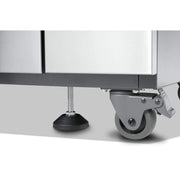 Close-up of a metal cabinet with wheels on a white background