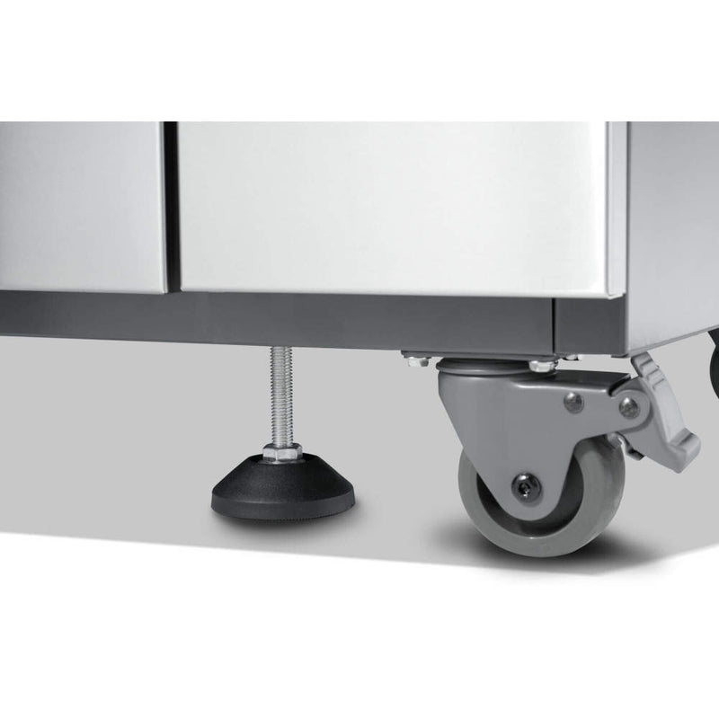 Close-up of a metal cabinet with wheels on a white background