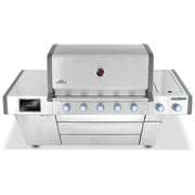 Stainless steel grill with multiple control knobs on a white background