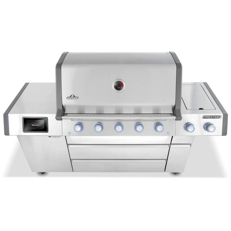 Stainless steel grill with multiple control knobs on a white background
