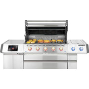 Stainless steel grill with digital display and control knobs on a white background