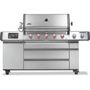 Stainless steel grill with multiple knobs on a white background