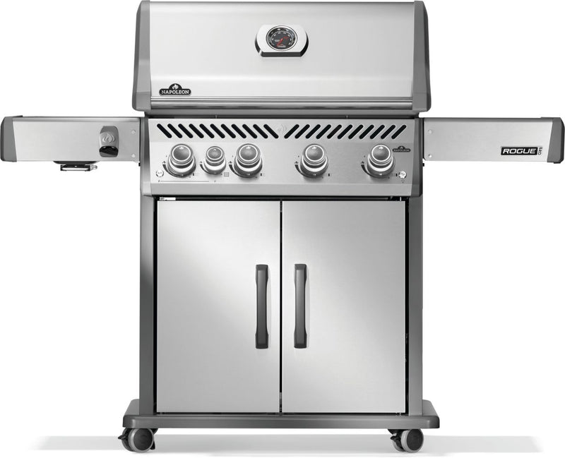 Stainless steel barbecue grill with multiple burners on a white background