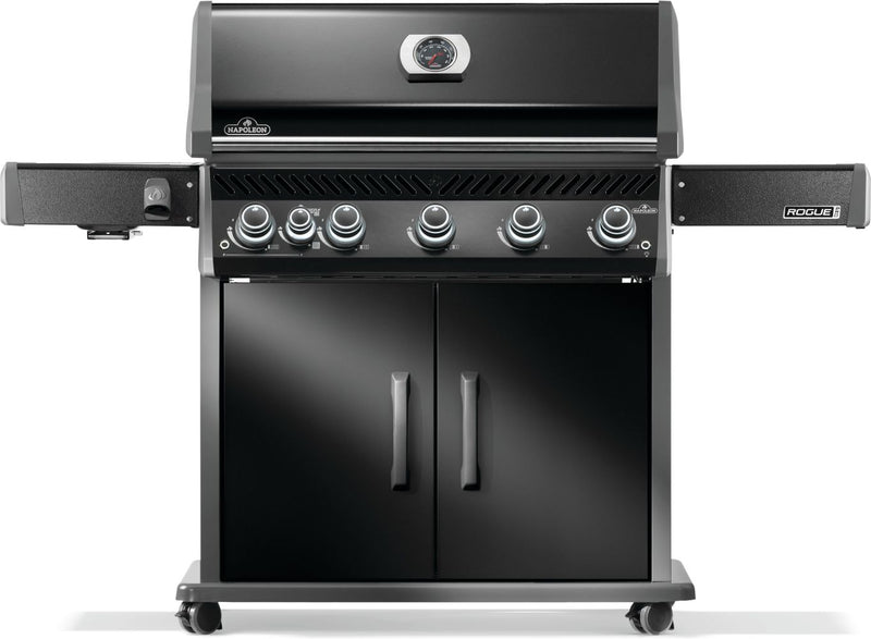 Black barbecue grill with multiple burners on a white background