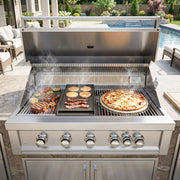 Stainless steel outdoor grill with food cooking on a patio