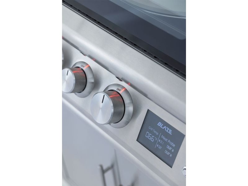Stainless steel gas stove with digital display and control knobs on a white background