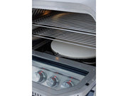 Stainless steel oven with racks and a white plate inside