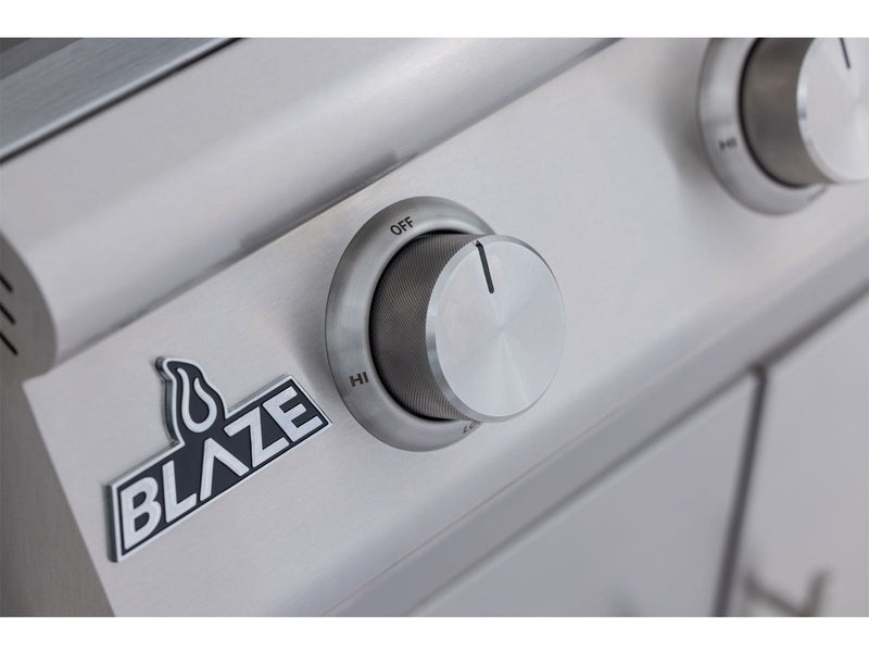 Close-up of a Blaze grill control knob with the Blaze logo.