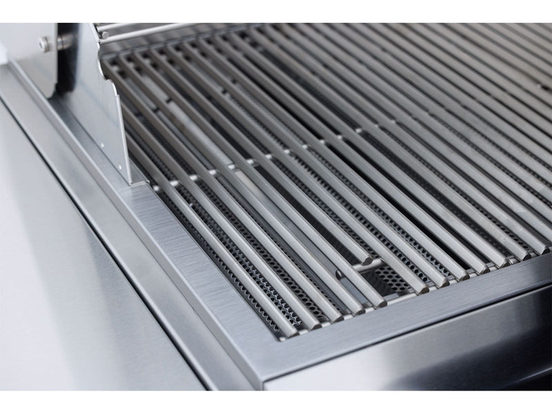 Close-up of a metallic grill surface on a kitchen appliance.