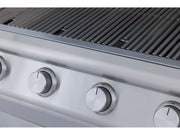 Stainless steel grill with control knobs on a blurred background