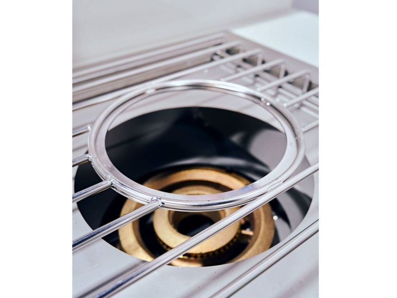 Close-up of a gas stove burner with visible flames