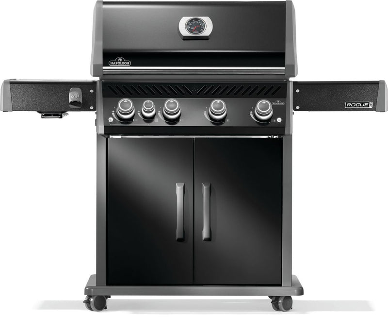 Black barbecue grill with multiple burners on a white background